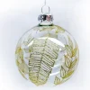 ORN GLASS BALL 3″ CLEAR W/ GOLD GLITTER LEAF PATTERN