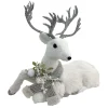 REINDEER SITTING FAUX GRASS WHITE 15.5″x13.5″ W/ SCARF, FROSTED PINE & BERRIES